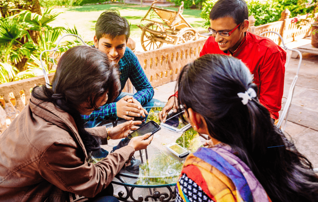 Friends sitting on a round table
